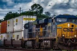 A CSX train with JB Hunt containers heads towards the camera.