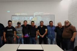 Former Honda workers gather for a photo at a press conference. 