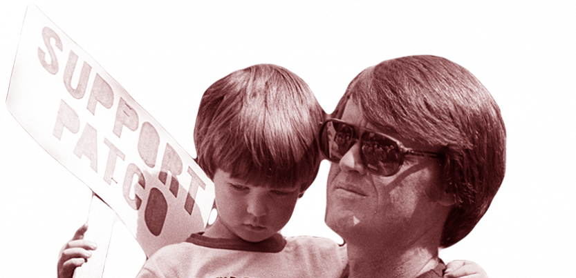 Patco striker and child with picket sign