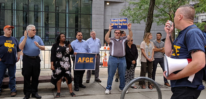 EPA workers protest the government's anti-union directive at a union rally in Manhattan in August.