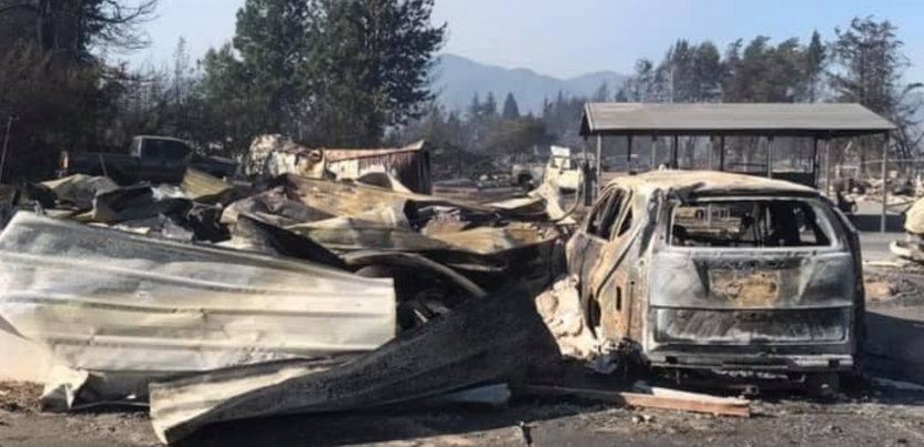 building and vehicle totally destroyed by fire
