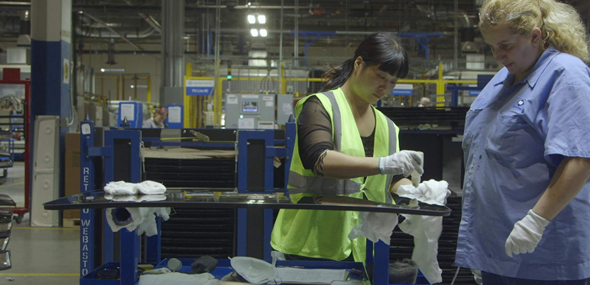 Two workers at work from the documentary American Factory