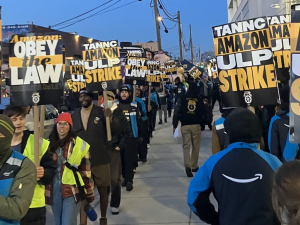 Two lines of striking Amazon workers picket.