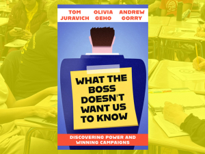 A book cover of “What the Boss Doesn’t Want You to Know” is shown on a background of workers meeting