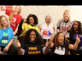 Eight teacher leaders from the Unions We Deserve slate pose together, smiling and giving thumbs-up. T-shirt slogans include "flree minds," "Black lives matter at school," "Baltimore schools for Baltimore students," and "build one Baltimore"
