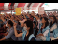 Taiwanese flight staff assembled in protest with arms raised.