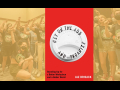 Cover of book is superimposed on Starbucks workers with fists in the air.
