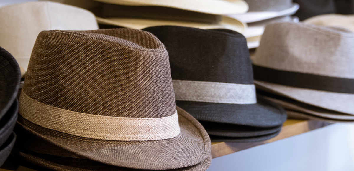 Stacks of hats on display at a store.