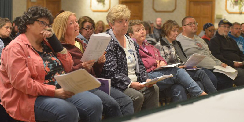 People sitting in the front row at the Stop & Shop workers UFCW 1459 contract ratification.