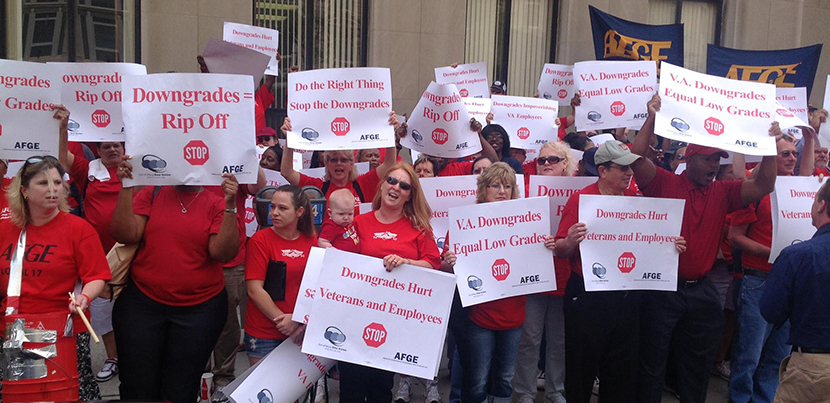 VA AFGE protesters assembled in red with signs