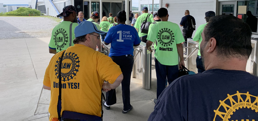 Workers in pro and con shirts before the UAW election at VW's plant in Chattanooga, Tennessee.