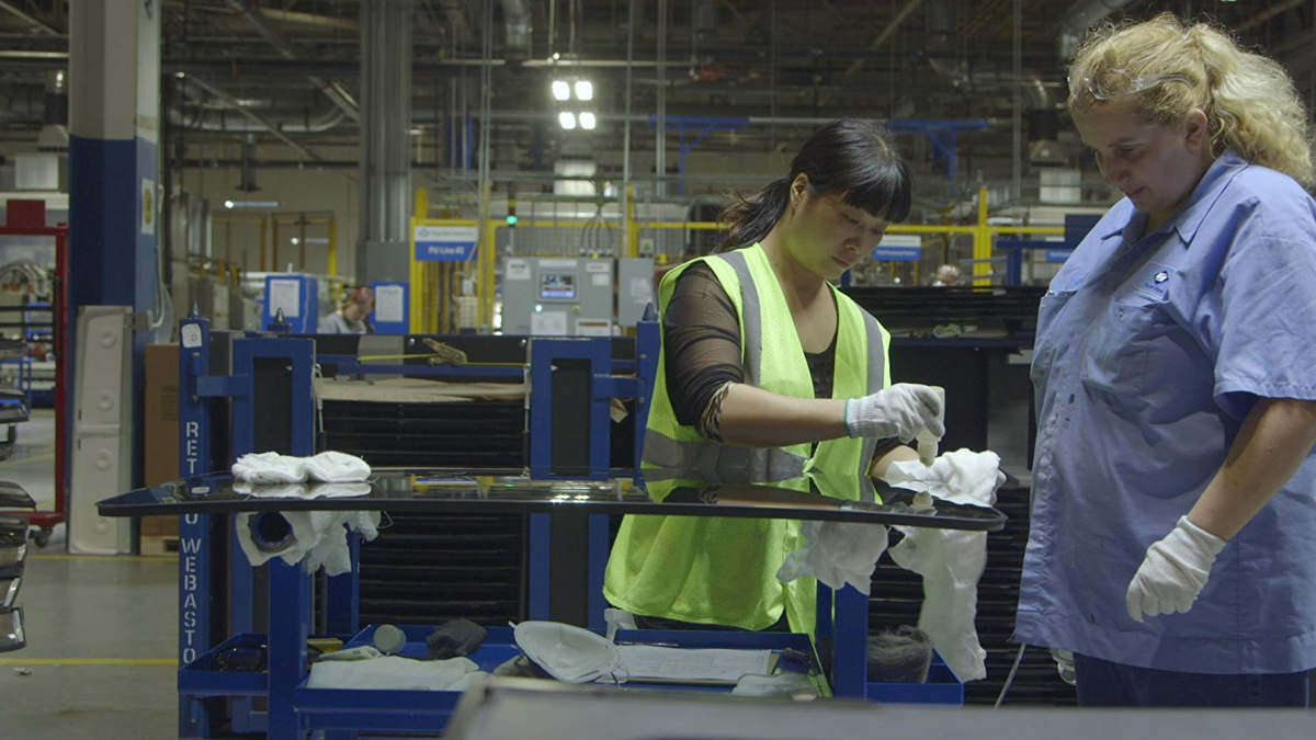 Two workers at work from the documentary American Factory