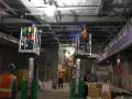 Electrical workers in a tunnel.