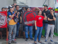 Filipino workers rally outside Kawasaki Motors.
